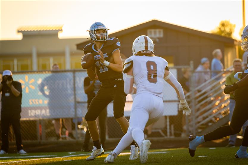 Student-athletes play football